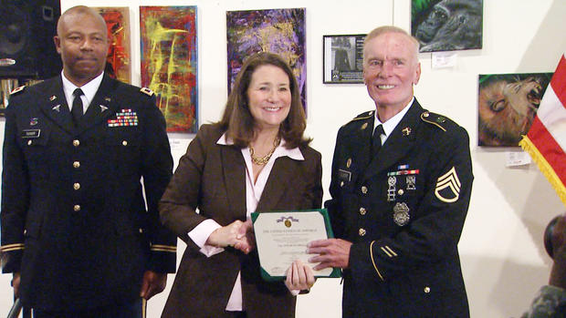 Rep. Diana DeGette presented the Soldier's Medal to Army Spc. Joseph Gilmore 