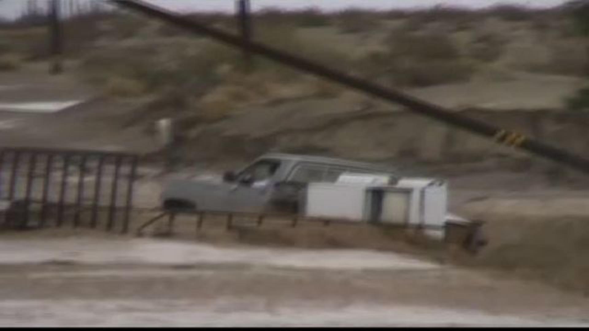 Watch: Truck swept away by flash flood