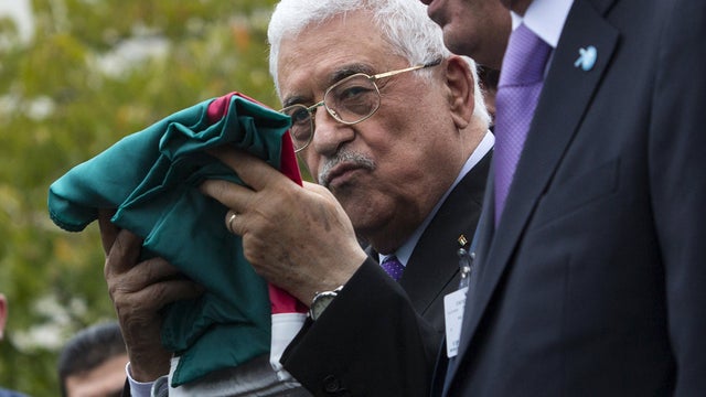 ​Palestinian President Mahmoud Abbas Palestinian flag 