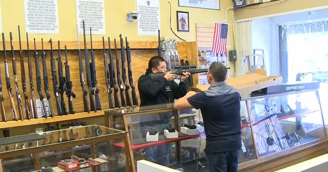 Gun shares surge as Clinton calls for restrictions - CBS News