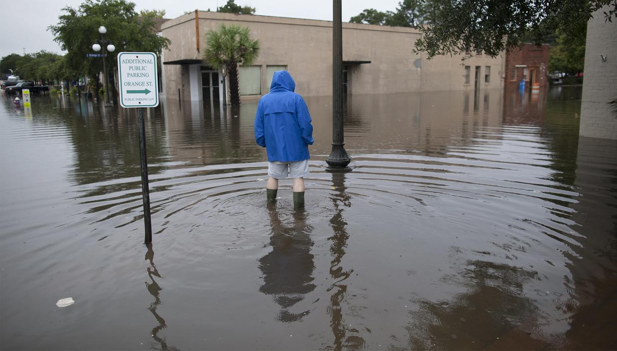 Historic rainfall pounds South Carolina - CBS News