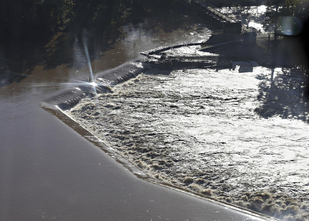 Floodwaters rush over a diversion dam in Columbia, South Carolina, Oct. 6, 2015. 