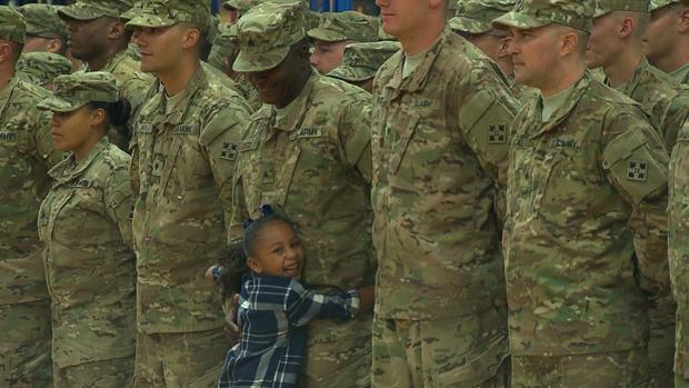 Families Cheer Returning Troops At Fort Carson On Oct. 21, 2015 