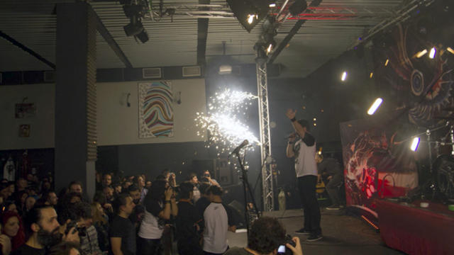 A member of the Romanian metal band Goodbye to Gravity performs as fireworks erupt on the stage of a nightclub before a fire broke out in Bucharest, Romania, Oct. 30, 2015. 