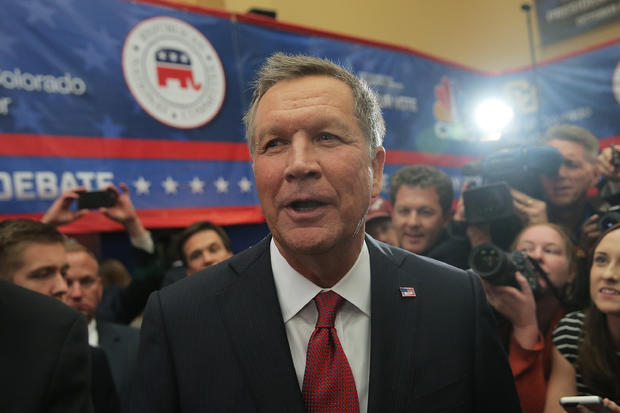 Presidential candidate Ohio Gov. John Kasich speaks to the media in the spin room after the CNBC Republican Presidential Debate at the University of Colorado's Coors Events Center Oct. 28, 2015, in Boulder, Colorado. 