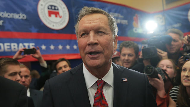 Presidential candidate Ohio Gov. John Kasich speaks to the media in the spin room after the CNBC Republican Presidential Debate at the University of Colorado's Coors Events Center Oct. 28, 2015, in Boulder, Colorado. 