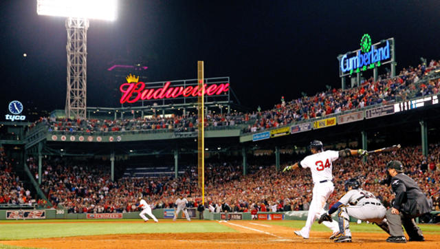 FILE- In this Oct. 18, 2004, file photo, Boston Red Sox's David Ortiz  celebrates his 14th inning game-winning single that scored teammate Johnny  Damon to beat the New York Yankees 5-4 in