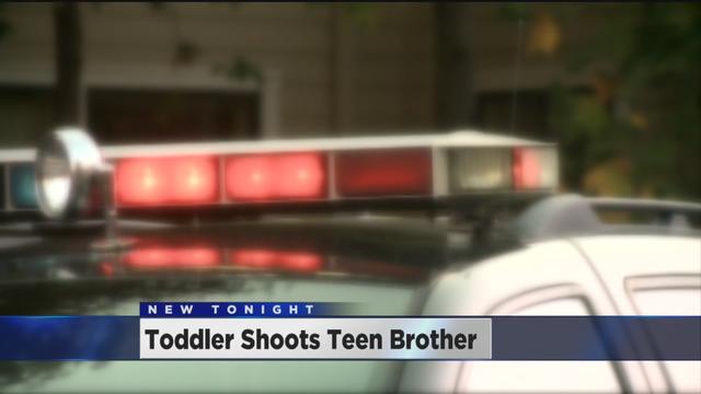 toddler-shoots-teen-brother.jpg 