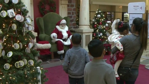 ​A California family visits Santa Claus. 