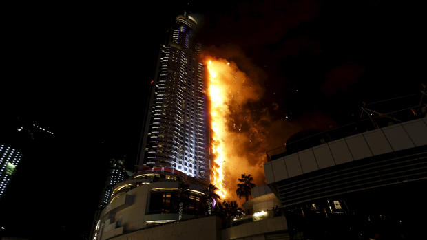 Dubai skyscraper engulfed in flames 
