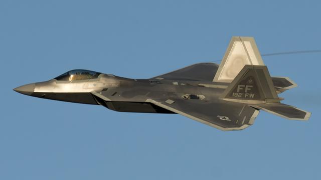 A US Air Force Lockheed Martin F-22 Raptor stealth fighter aircraft performs a demonstration 