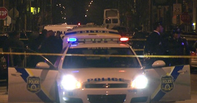 Gunman in custody after ambushing Philadelphia cop - CBS News