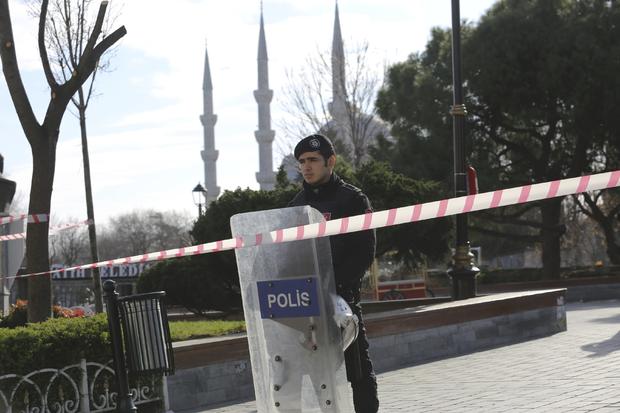 A police officer secures the area after an explosion near the Ottoman-era Sultanahmet mosque, known as the Blue mosque in Istanbul 