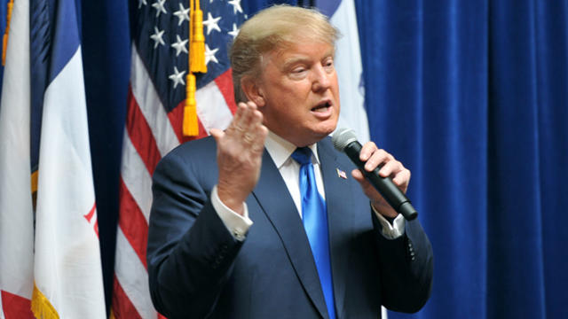 Republican presidential candidate Donald Trump speaks to potential supporters at a campaign stop at Living History Farms in Urbandale, Iowa, Jan. 15, 2016. 