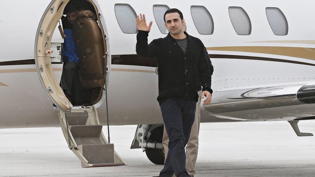 Former U.S. Marine Amir Hekmati, recently released from an Iranian prison, arrives at an airport in Flint, Michigan, Jan. 21, 2016. 