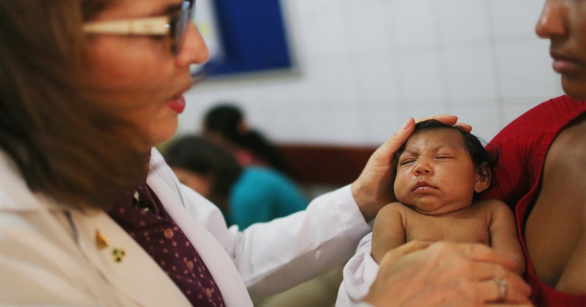 Travel alert expands as Zika virus cases spread - CBS News