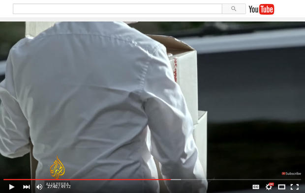 al jazeera doping doc screenshot - brandon spletzer with boxes of drugs 