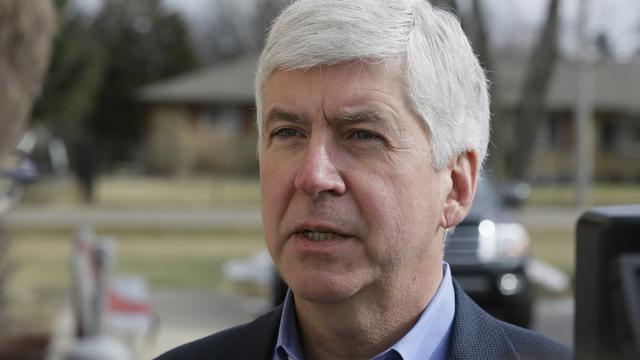 Michigan Gov. Rick Snyder is interviewed after he visited a church that's distributing water and filters to its predominantly Latino parishioners in Flint, Mich., Feb. 5, 2016. 