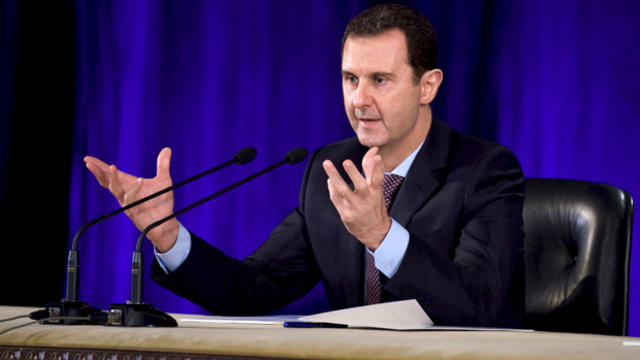 Syria's President Bashar Assad speaks during a meeting with members of the Central Bar Association in Damascus in this handout picture provided by SANA on Feb. 15, 2016. 