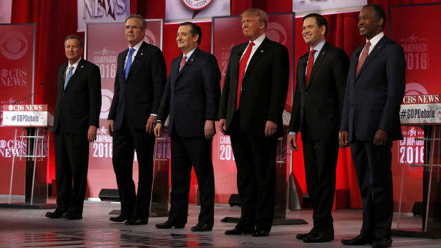 The remaining Republican presidential candidates, from left to right, Gov. John Kasich, former Gov. Jeb Bush, Sen. Ted Cruz, businessman Donald Trump, Sen. Marco Rubio and Dr. Ben Carson pose before the start of the CBS News Republican Debate in Greenvill 