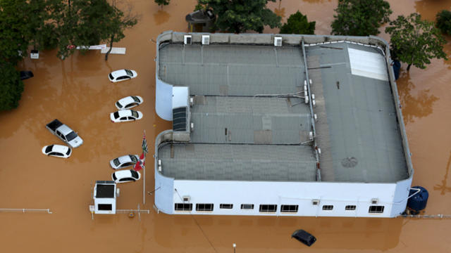 ​Cars are seen in a flooded street in the city of Franco da Rocha, in the north of Sao Paulo state, Brazil, March 11, 2016. 