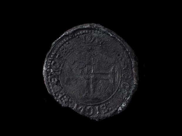 A rare Indio silver coin, dating back to 1499, recovered from a shipwreck off the coast of Oman 