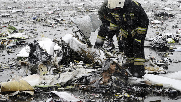 Emergencies Ministry members search the wreckage at the crash site of Flight 981, a Boeing 737-800 operated by Dubai-based budget carrier FlyDubai, at the airport of Rostov-On-Don, Russia, March 19, 2016. 