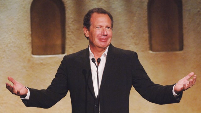 Actor Garry Shandling gestures at the fifth annual Project A.L.S. benefit gala in Los Angeles May 6, 2005. 