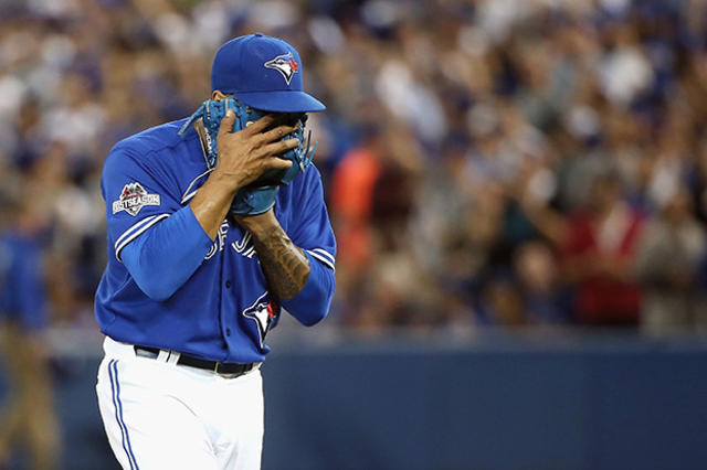 Toronto Blue Jays Marcus Stroman reacts as he heads back to the