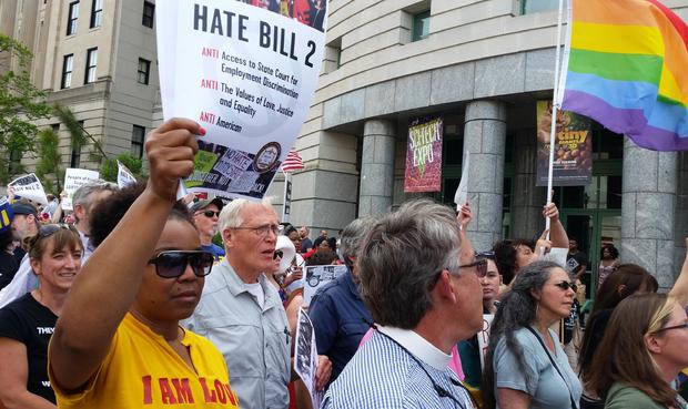 Protesters march to show their opposition against North Carolina's "HB2" (House Bill 2) law, what they called 'Hate Bill 2,' which they urged lawmakers to repeal as legislators convened for a short session in Raleigh, North Carolina April 25, 2016 