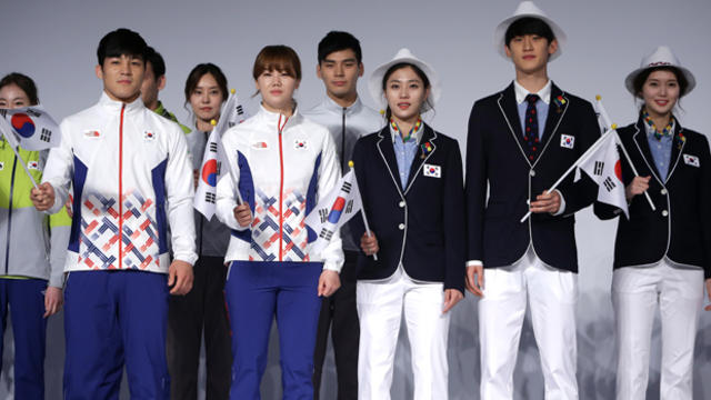 South Korean Olympians and models pose during the official uniform launch at Taereung National team training center on April 27, 2016, in Seoul, South Korea. 