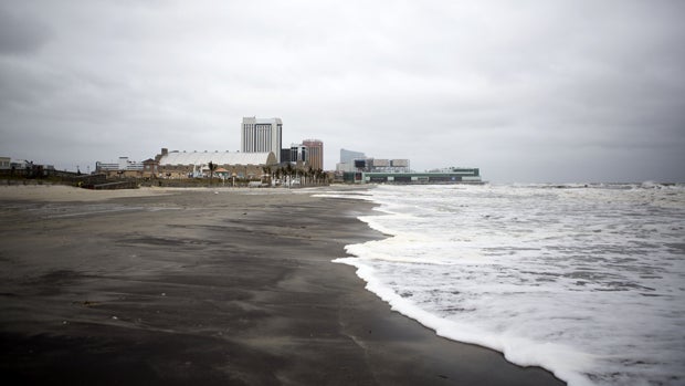 Waves hit the beach during high tide on Oct. 4, 2015, in Atlantic City, New Jersey. 
