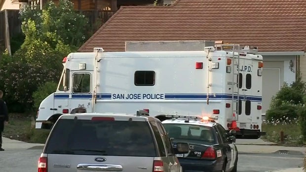 ​Police in San Jose, California, work the scene after a couple was found murdered in their home April 24, 2016. 