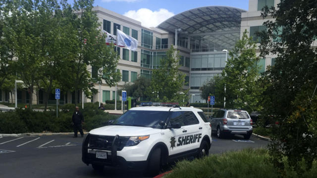 A Santa Clara County sheriff's department vehicle is shown parked outside one of the main office buildings of the Apple campus in Cupertino, California, April 27, 2016. 