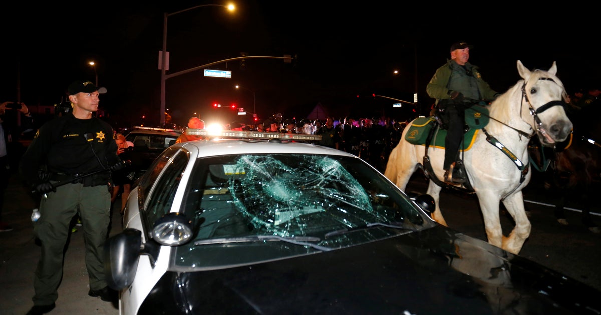 Protests, unrest outside large Trump rally in Southern California - CBS ...