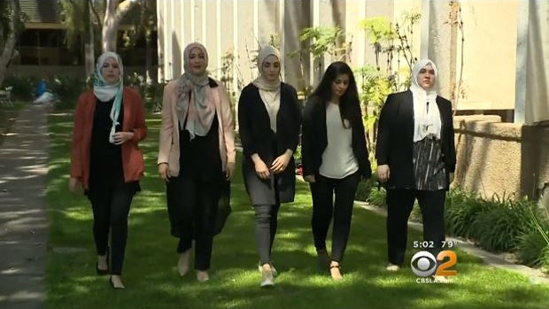 ​Sara Farsakh, second from left, and her friends, who are suing a Southern California cafe for discrimination, are seen before making a statement to reporters May 3, 2016. 