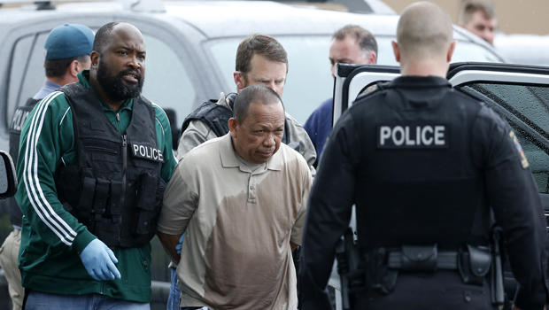 ​Police take Eulalio Tordil, 62, a suspect in three fatal shootings in the Washington, D.C., area into custody in Bethesda, Md., May 6, 2016. 