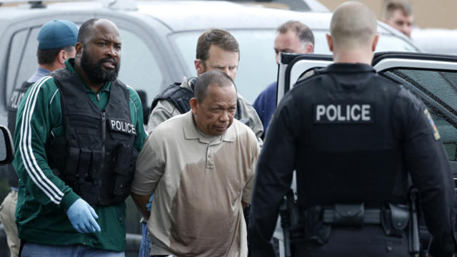 ​Police take Eulalio Tordil, 62, a suspect in three fatal shootings in the Washington, D.C., area into custody in Bethesda, Md., May 6, 2016. 