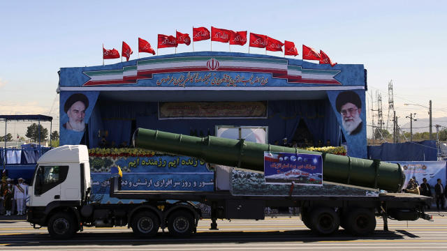 An Iranian military truck carries parts of the S200 missile system during an Army Day parade in Tehran 