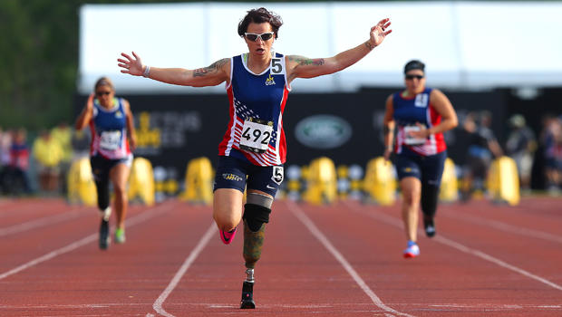 Sarah Rudder crosses the finish line in first place during the Invictus Games Orlando 2016 Track & Field Finals at the ESPN Wide World of Sports Complex on May 10, 2016, in Lake Buena Vista, Florida. 