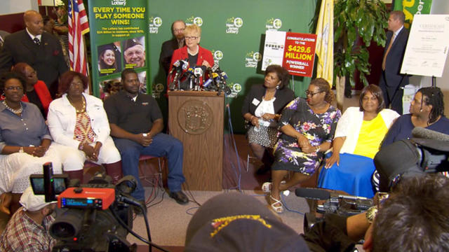 Carole Hedinger, the New Jersey Lottery's executive director, introduces the Smith family as the winners of a $429.6 million Powerball jackpot at the lottery's headquarters in Lawrenceville, N.J., on May 13, 2016.​ 