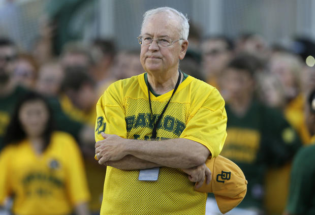 Then-Baylor President Ken Starr waits to run onto the field before an NCAA college football game in Waco, Texas, on Sept. 12, 2015. 