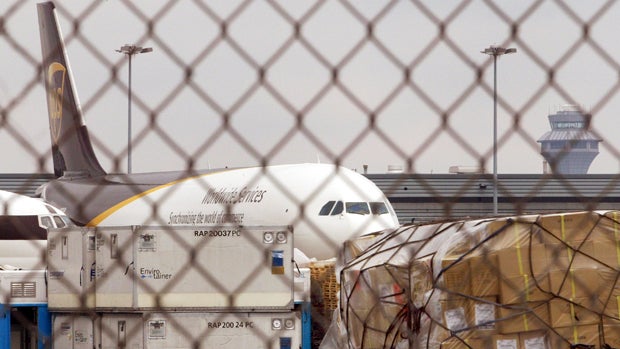 A United Parcel Service plane is parked beyond security fencing in the air cargo area of O'Hare International Airport March 1, 2004, in Chicago, Illinois. 