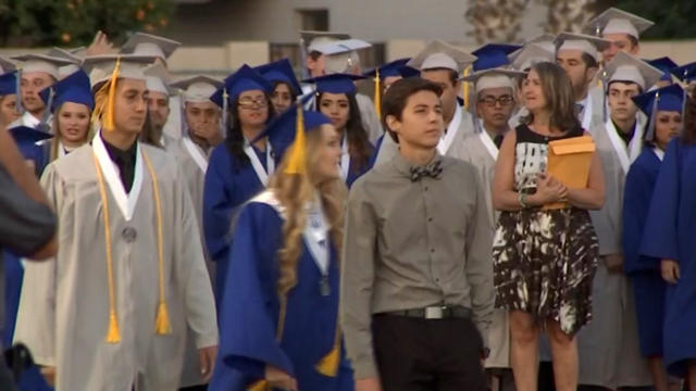 ​Stephen Dwyer leads his class as student body president during the graduation ceremony for Dobson High School in Mesa, Arizona, on May 26, 2016. 