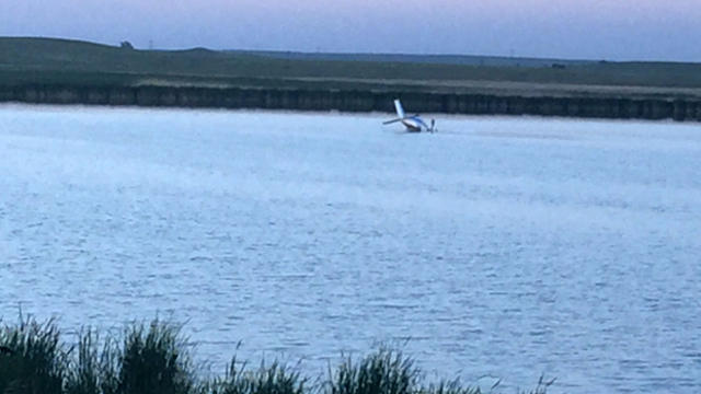 A small plane being flown by a 19-year-old crashed into a lake near Wishek, North Dakota, on June 9, 2016. 