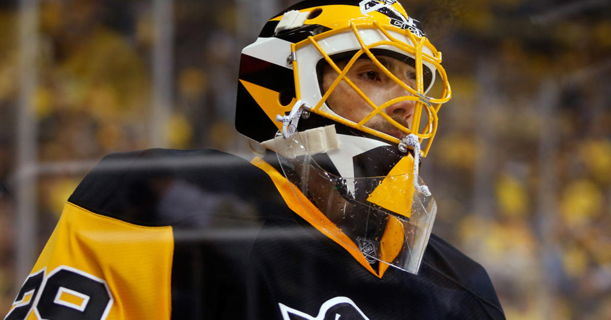 Pittsburgh Penguins goalie Marc-Andre Fleury watches as