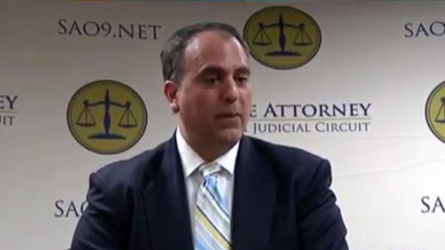 Florida Assistant State Attorney Kenneth Lewis speaks at an event in this image capture from video obtained by CBS Orlando affiliate WKMG-TV. 