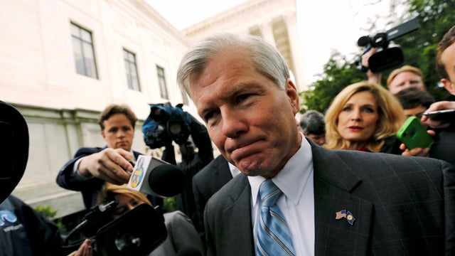 Former Virginia Gov. Bob McDonnell is trailed by reporters as he departs after his appeal of his 2014 corruption conviction was heard at the U.S. Supreme Court in Washington on April 27, 2016. 
