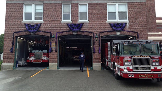 ​Bunting hangs outside a fire station in Stoneham, Massachusetts, in honor of firefighter David Atherton on June 29, 2016. 