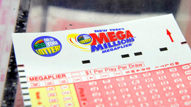 A ticket is seen ahead of the Mega Millions lottery draw in Manhattan, New York, July 1, 2016. 
